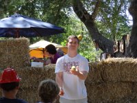 DSC00557  Sebastopol - Gravenstein Apple Fair:  Michael participates in an apple juggling contest.  He won! : From MobileMe, Michael Carlson