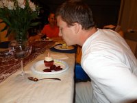 DSC00567  Birthday celebration:  Since the visit was in between the boys' birthdays, we had one big celebration.  Michael blows out the candle on his cupcake. : From MobileMe