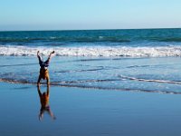 IMG_1477  Stinson Beach:  Ethan shows off his gymnastics skills with a handstand. : From MobileMe