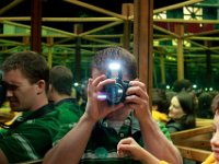 IMG_1569  San Francisco - Exploratorium:  Michael tries to capture the many reflections in a mirror exhibit while Anna and Ethan observe. : From MobileMe