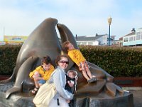 IMG_1576  San Francisco - Pier 39:  Ethan, Brooke, Elizabeth, and Aidan strike a pose with some sculpted sea lions. : From MobileMe